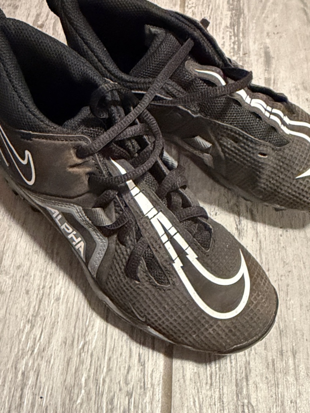Nike Black Athletic Cleats with White Accents Boys Size 2